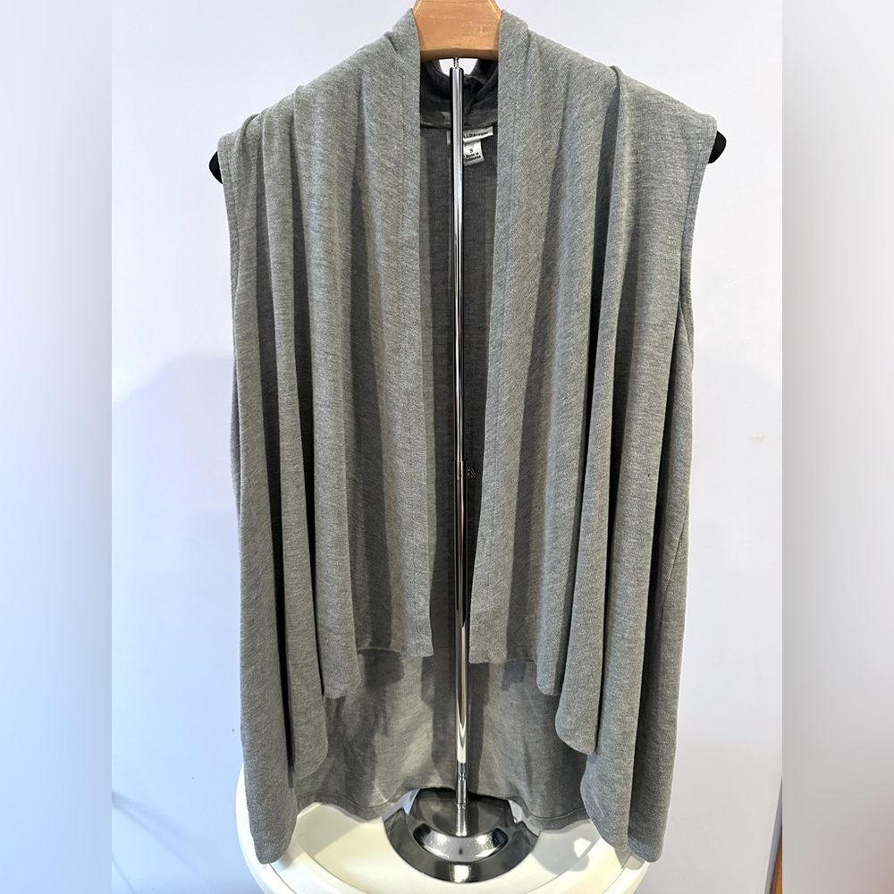 Like new. Gray. Sleeveless. Cross front.
